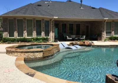 The Summer Ridge Project by All Star Pools - Tropical Paradise Lagoon Pool & Spa with Boulder Waterfall & Outdoor Kitchen