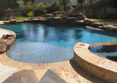 The Summer Ridge Project by All Star Pools - Tropical Paradise Lagoon Pool & Spa with Boulder Waterfall & Outdoor Kitchen Custom Swimming Pool and Spa Designs