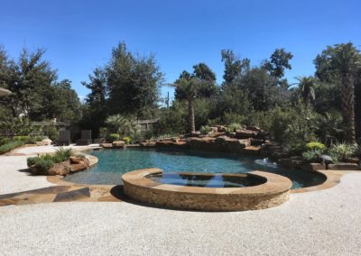 The Summer Ridge Project by All Star Pools - Tropical Paradise Lagoon Pool & Spa with Boulder Waterfall & Outdoor Kitchen Custom Swimming Pool and Spa Designs