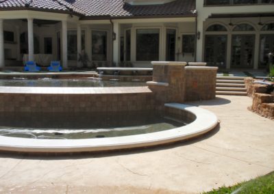 Natural Swimming Pools Colona Project - Showcase Multilevel Vanishing Edge Pool with Spa and Outdoor Kitchen.